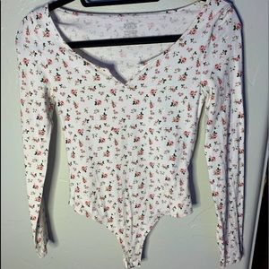 White floral along sleeve PINK bodysuit